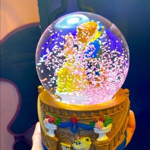 Pink and Yellow Doll Snow Globe with Glittering Effects